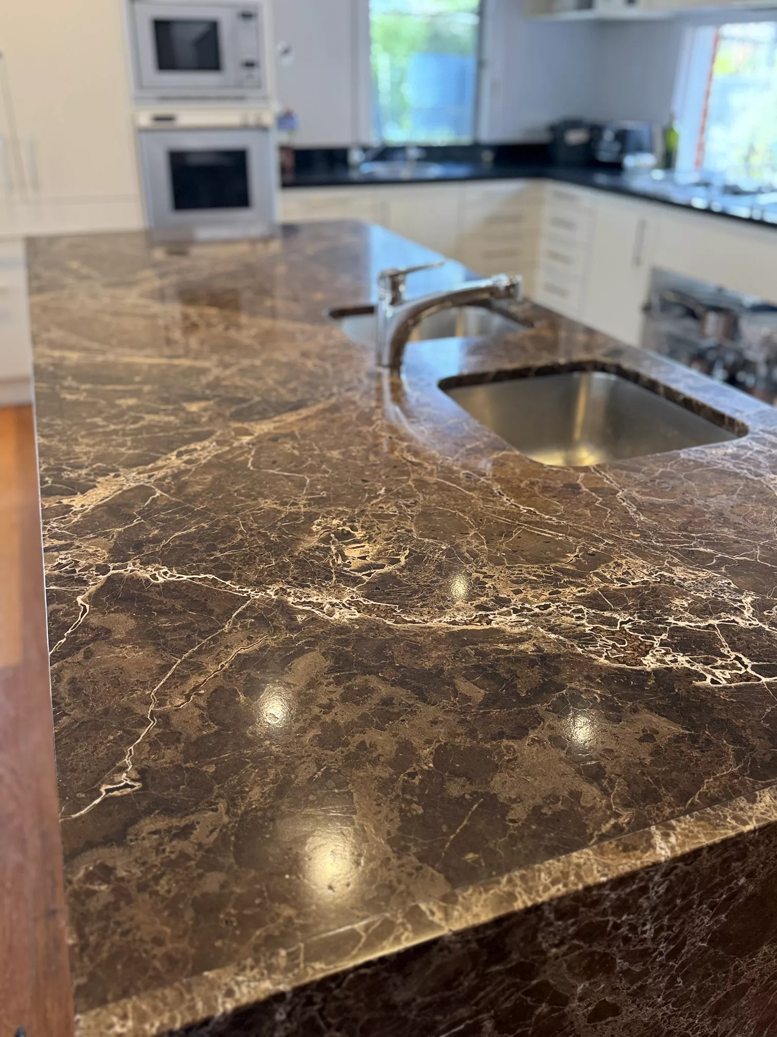 Marble polishing Melbourne, natural stone repair Melbourne, marble scratch removal, marble sealing service, stone floor maintenance, kitchen benchtop restoration Melbourne.